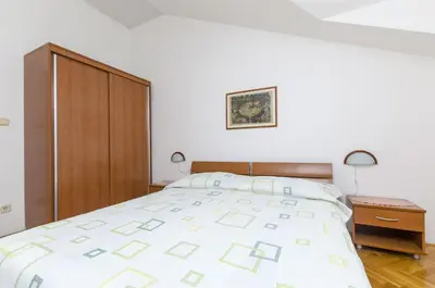 Krevet ili kreveti u jedinici u objektu Apartment and Rooms Mate