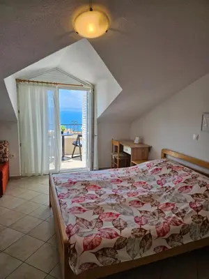 Krevet ili kreveti u jedinici u objektu Apartments Adriatika
