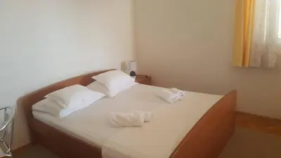 Krevet ili kreveti u jedinici u objektu Apartments Villa Anna