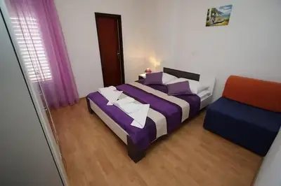 Krevet ili kreveti u jedinici u objektu Apartments with parking space Makarska - 24071