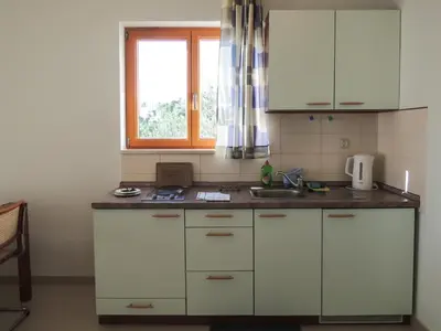 Kuhinja ili čajna kuhinja u objektu Apartment 3785-2 for 3 Pers in Baska Voda