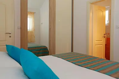 Krevet ili kreveti u jedinici u objektu Robinzon Villa Zavala