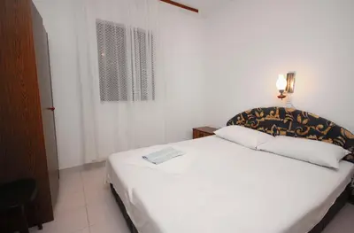 Krevet ili kreveti u jedinici u objektu Apartments by the sea Stomorska, Solta - 782