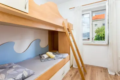 Krevet ili kreveti u jedinici u objektu Apartment Postira 2948b