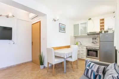 Kuhinja ili čajna kuhinja u objektu Apartment Postira 2948b