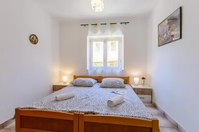 Krevet ili kreveti u jedinici u objektu Apartments by the sea Sumartin - Brac - 2952