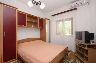 TV i/ili zabavni centar u objektu Apartments by the sea Sumartin, Brac - 5620