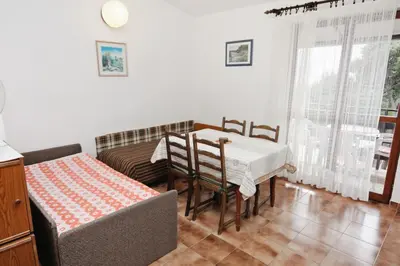 Krevet ili kreveti u jedinici u objektu Apartments by the sea Nemira, Omis - 5884