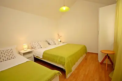 Krevet ili kreveti u jedinici u objektu Supetar Apartment City Center