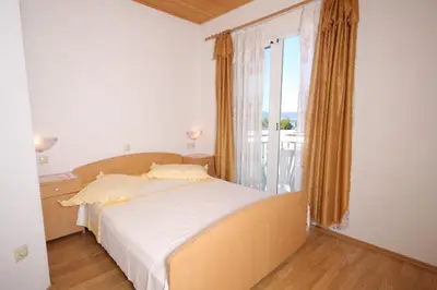Krevet ili kreveti u jedinici u objektu Apartments with parking space Brela, Makarska - 6895