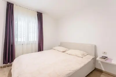 Krevet ili kreveti u jedinici u objektu Apartments by the sea Duce, Omis - 8378