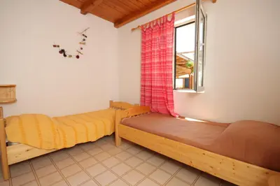 Krevet ili kreveti u jedinici u objektu Apartments and rooms by the sea Cove Zarace, Hvar - 8781
