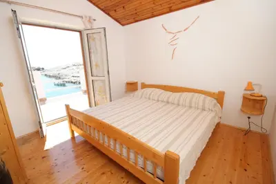 Krevet ili kreveti u jedinici u objektu Apartments and rooms by the sea Cove Zarace, Hvar - 8781
