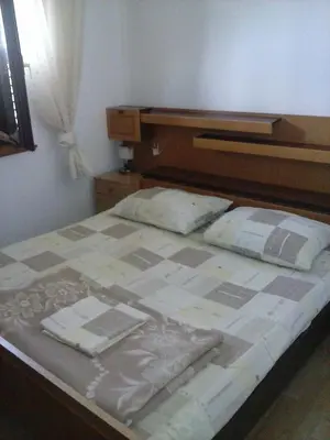 Krevet ili kreveti u jedinici u objektu Apartments by the sea Pisak, Omis - 9456
