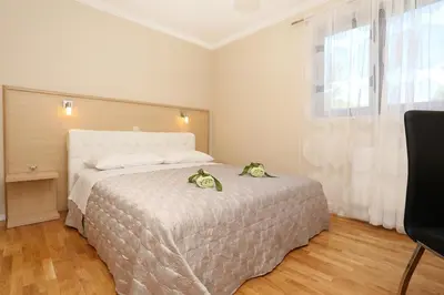Krevet ili kreveti u jedinici u objektu Apartments with a parking space Zrnovnica, Split - 9493