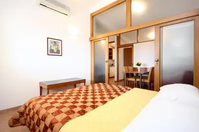Krevet ili kreveti u jedinici u objektu Apartment Baska Voda 10027a