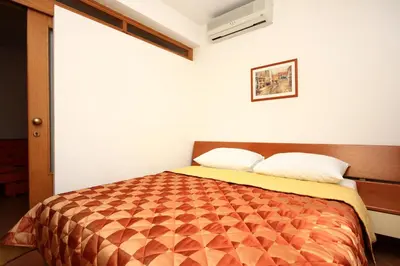 Krevet ili kreveti u jedinici u objektu Apartment Baska Voda 10027d