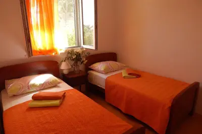 Krevet ili kreveti u jedinici u objektu Apartments by the sea Cove Osibova, Brac - 23774
