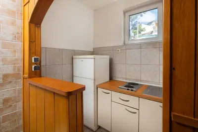 Kuhinja ili čajna kuhinja u objektu Siesta Beachfront Apartments