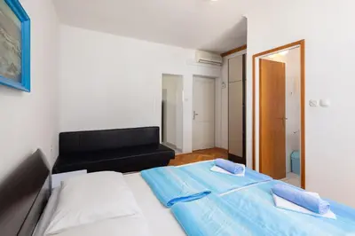 Krevet ili kreveti u jedinici u objektu Siesta Beachfront Apartments