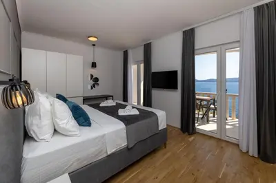 Krevet ili kreveti u jedinici u objektu Apartmani LIKI