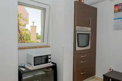 Kuhinja ili čajna kuhinja u objektu Apartment Nena