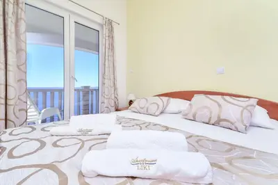 Krevet ili kreveti u jedinici u objektu Apartmani Liki