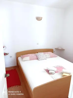 Krevet ili kreveti u jedinici u objektu Apartmani Makarska 15