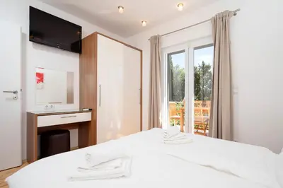 Krevet ili kreveti u jedinici u objektu Vindobona Apartment 2