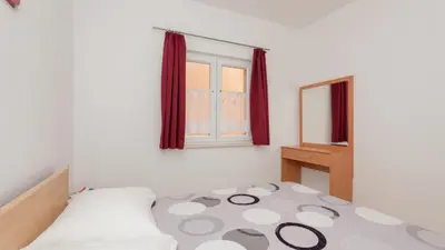 Krevet ili kreveti u jedinici u objektu Apartman Erstic 1 - Baska Voda by Villas Guide