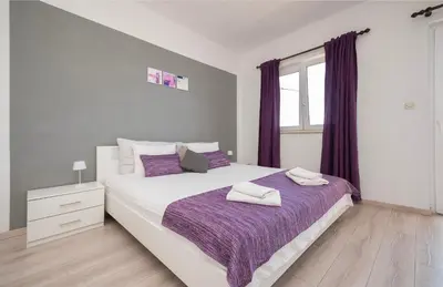 Krevet ili kreveti u jedinici u objektu Apartments Zvonko