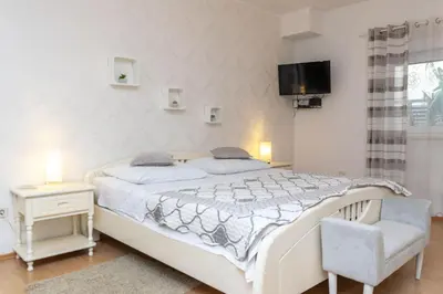 Krevet ili kreveti u jedinici u objektu Apartments Knez