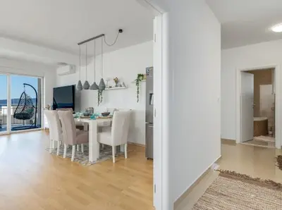 TV i/ili zabavni centar u objektu Deluxe 3 bedroom apartment with sea view