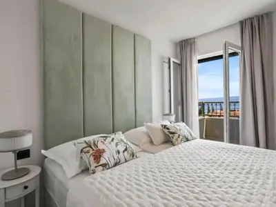 Krevet ili kreveti u jedinici u objektu Three-Bedroom Penthouse Apartment