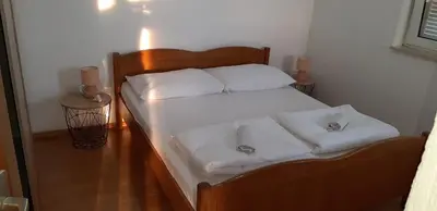 Krevet ili kreveti u jedinici u objektu Apartments Kalajžić