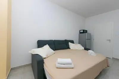 Krevet ili kreveti u jedinici u objektu Apartmani Makarska 19