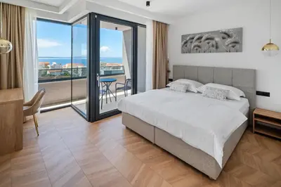 Krevet ili kreveti u jedinici u objektu Villa Pavuza Luxury 4-Bedroom Seaview Villa