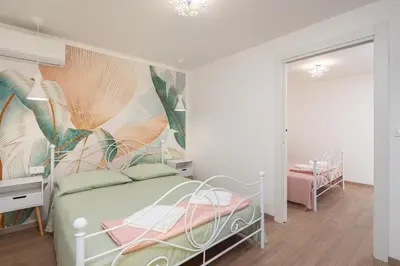 Krevet ili kreveti u jedinici u objektu Akvarel Apartment - Private Garden Terrace & BBQ