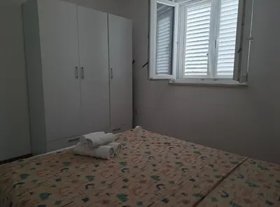 Krevet ili kreveti u jedinici u objektu Nane Garden house with heated pool