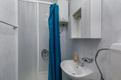 Kupaonica u objektu Apartments and rooms by the sea Brela, Makarska - 24416