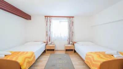 Krevet ili kreveti u jedinici u objektu Apartments Ana & Bogdan