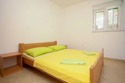 Krevet ili kreveti u jedinici u objektu Apartments Ivo