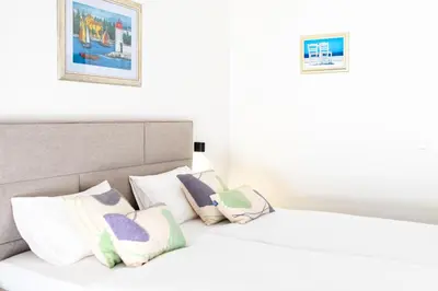 Krevet ili kreveti u jedinici u objektu Lavica Mare Retreat - Modern Apartment near Le Meridien Podstrana