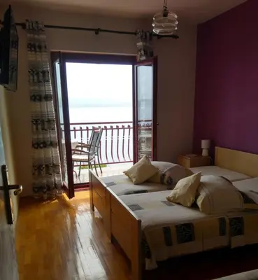 Krevet ili kreveti u jedinici u objektu Apartments Katica, Pisak