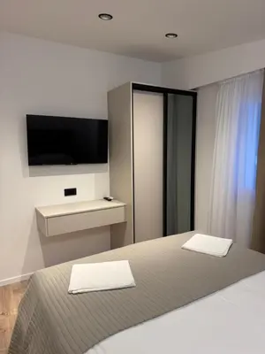 Krevet ili kreveti u jedinici u objektu Artemis Poolhouse Apartments