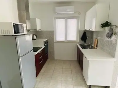 Kuhinja ili čajna kuhinja u objektu Villa Brazza - Two Bedroom Apartment 1