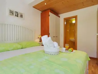 Krevet ili kreveti u jedinici u objektu Blissful Bay Apartments Vrboska - Classic Two Bedroom Apartment with Terrace
