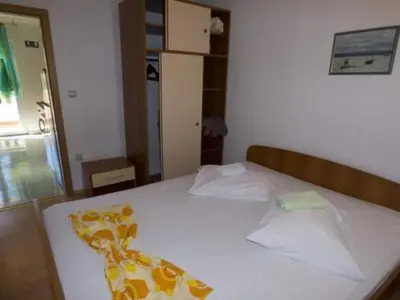 Krevet ili kreveti u jedinici u objektu Beachfront Apartments Pla a - Two Bedroom Apartment A2