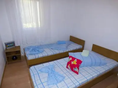 Krevet ili kreveti u jedinici u objektu Beachfront Apartments Pla a - Two Bedroom Apartment A2