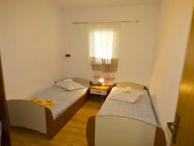 Krevet ili kreveti u jedinici u objektu Beachfront Apartments Pla a - Two Bedroom Apartment A4